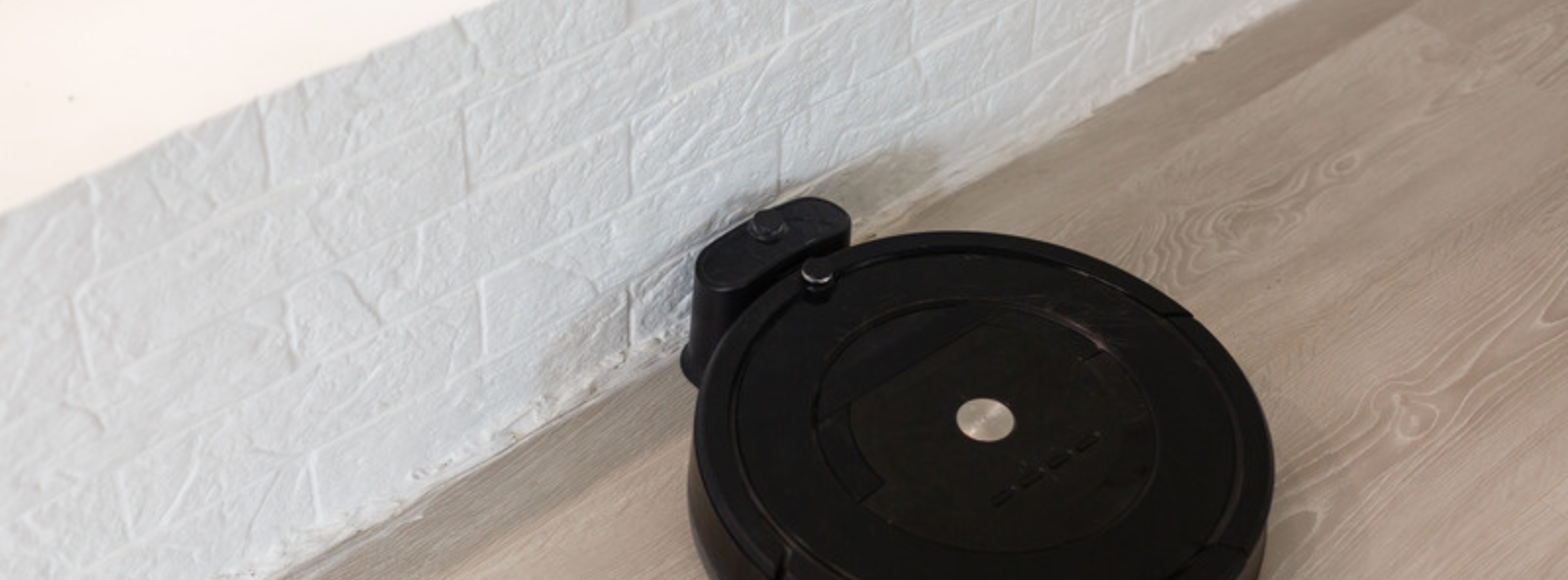 Robot vacuum cleaner at its charging dock