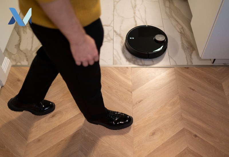Robot Vacuum On Marble Floor